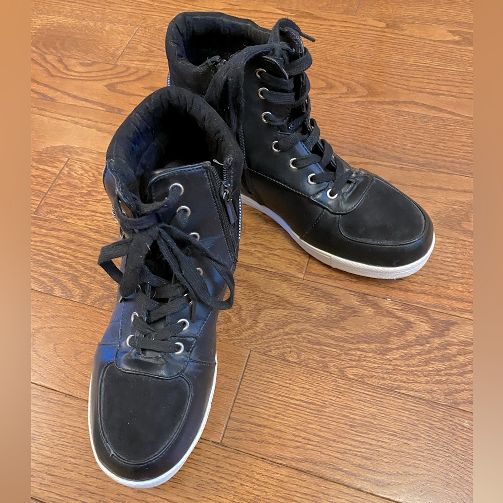 Torrid Hightop runners.